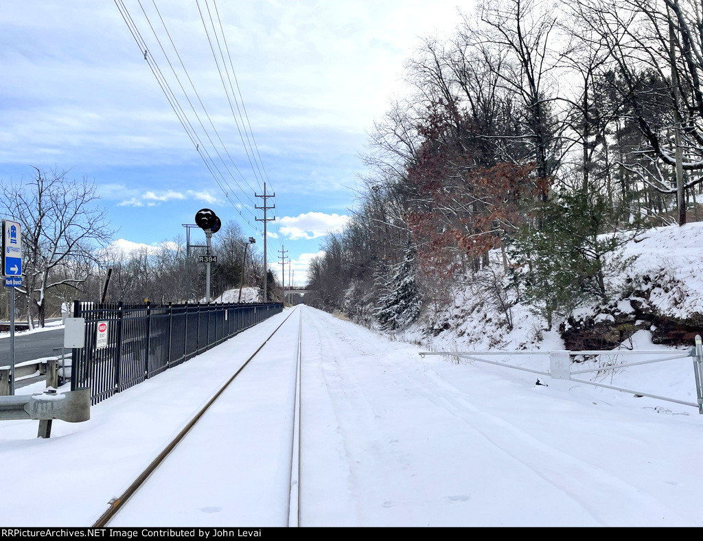 Looking east from North Branch Station-the small commuter lot is on the left behind the fence 